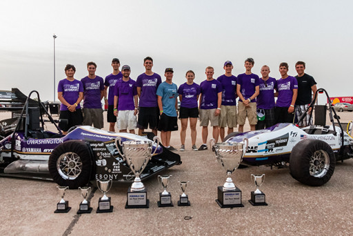 UW FSAE Team 24 lead group with our cars and trophies